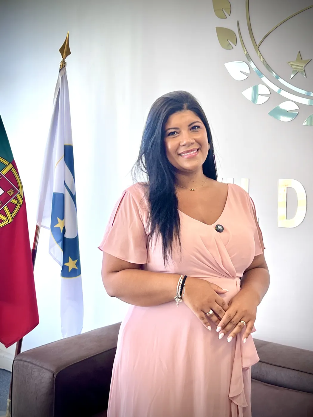 Suzelle seduta nella sala, prima dell'intervento